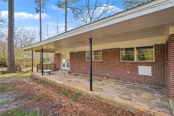 a view of a porch with a backyard