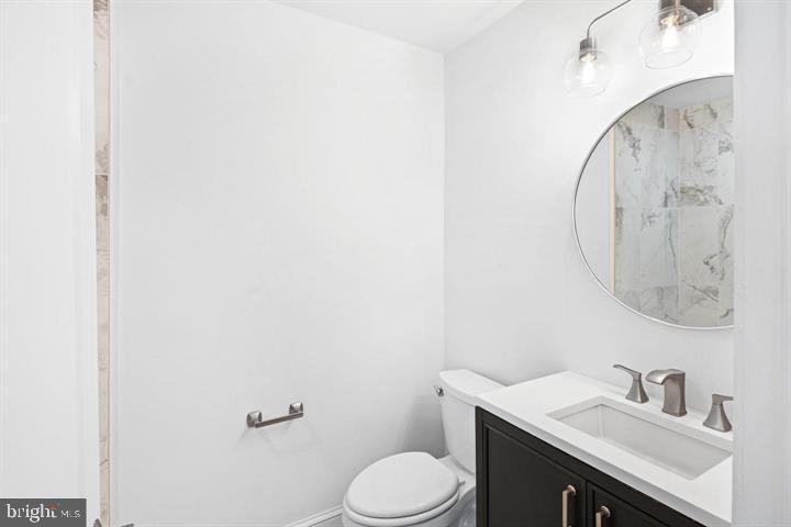 306 South 10th Street, Unit D Philadelphia, PA 19107 - Photo 21 of 35 a bathroom with a sink and a mirror