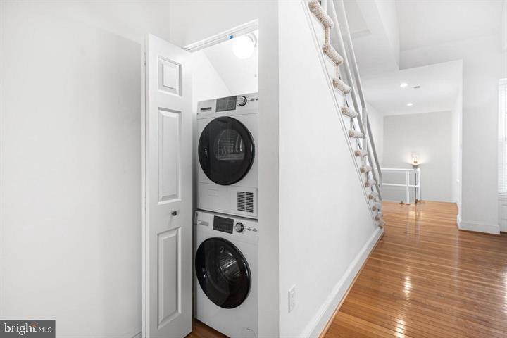 306 South 10th Street, Unit D Philadelphia, PA 19107 - Photo 23 of 35 a view of a hallway with washer and dryer