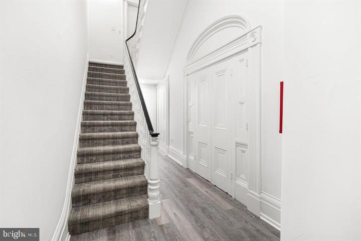306 South 10th Street, Unit D Philadelphia, PA 19107 - Photo 30 of 35 a view of a hallway with wooden floor and entryway
