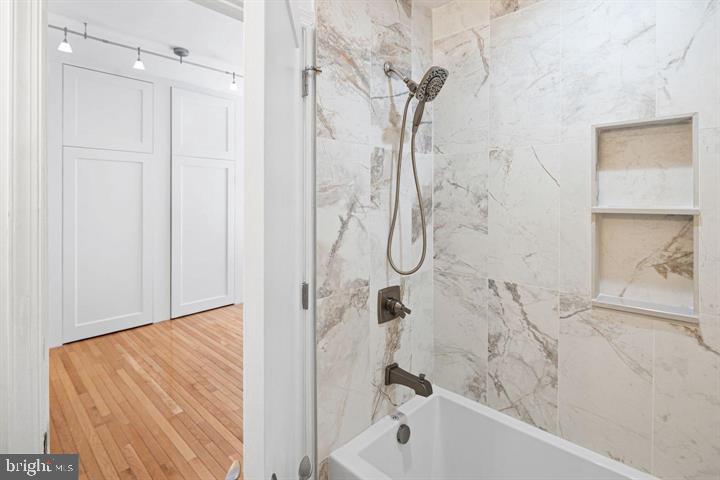 306 South 10th Street, Unit D Philadelphia, PA 19107 - Photo 5 of 35 a bathroom with a shower