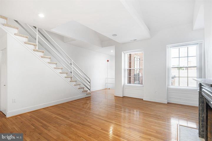 306 South 10th Street, Unit D Philadelphia, PA 19107 - Photo 7 of 35 a view of an empty room with wooden floor and a window