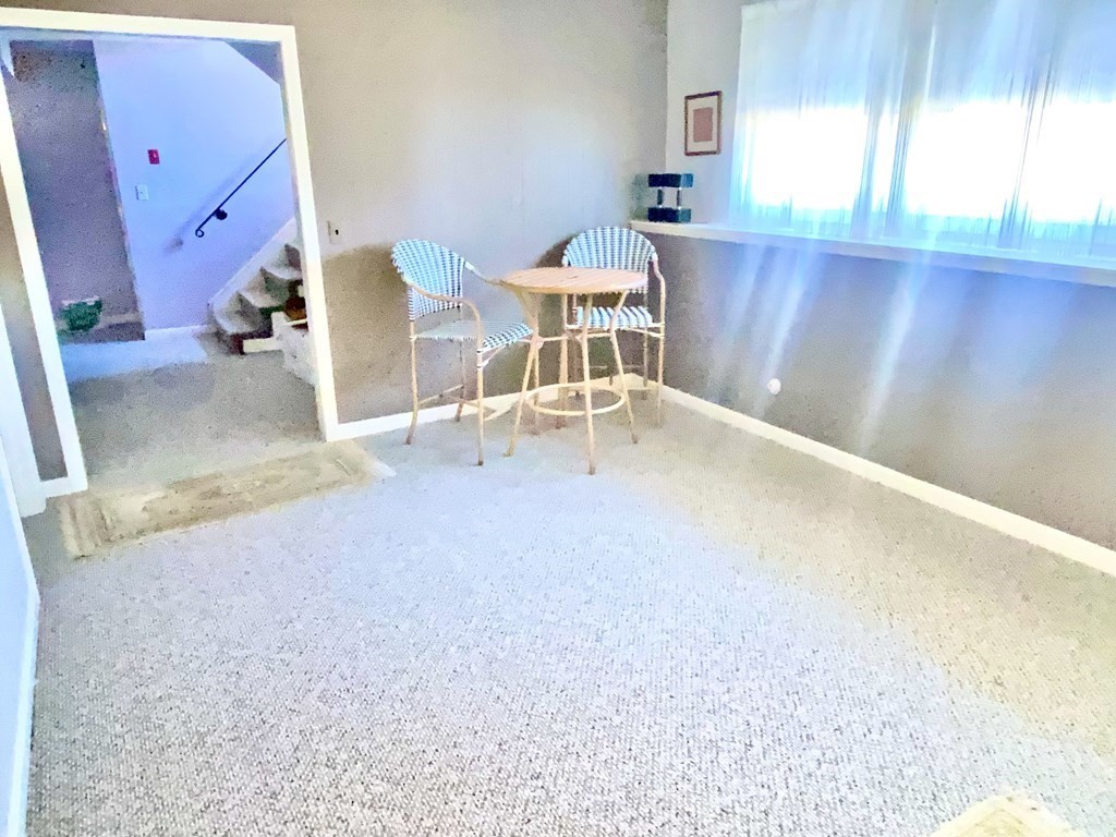 110 Carolyn Road Weymouth, MA 02190 - Photo 11 of 18 a view of a kitchen with a sink and a window