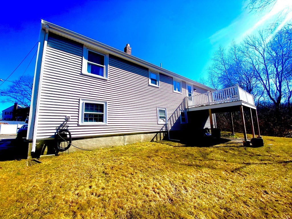 110 Carolyn Road Weymouth, MA 02190 - Photo 15 of 18 a view of a house with a patio