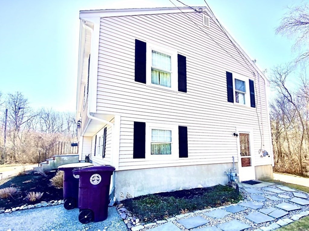 110 Carolyn Road Weymouth, MA 02190 - Photo 16 of 18 a view of a house with a yard
