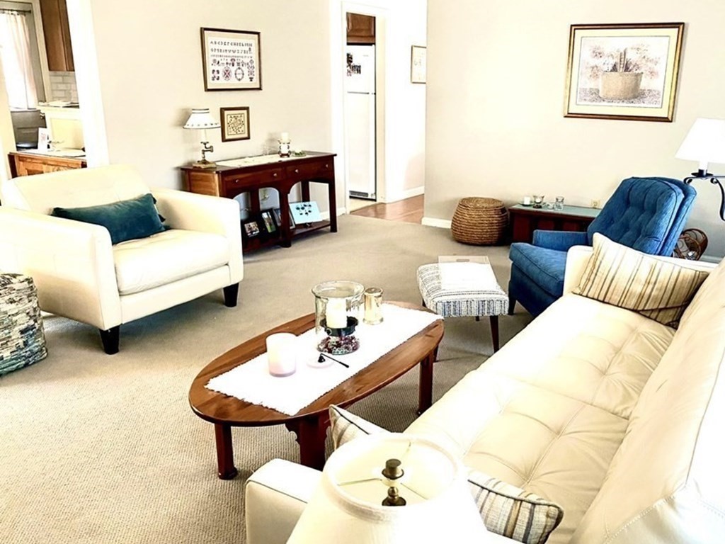 110 Carolyn Road Weymouth, MA 02190 - Photo 3 of 18 a living room with furniture and a couch