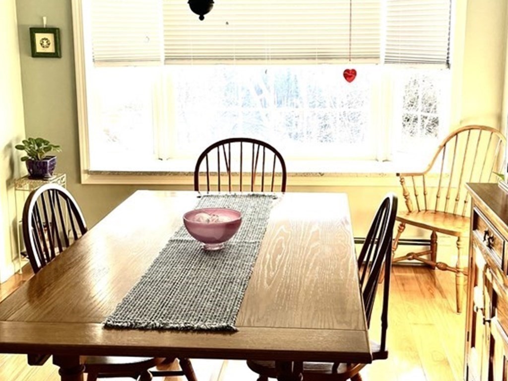 110 Carolyn Road Weymouth, MA 02190 - Photo 5 of 18 a view of a wooden table and chair
