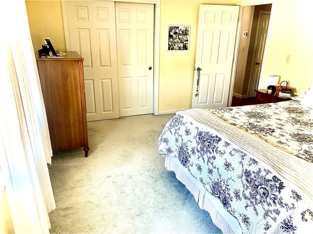 110 Carolyn Road Weymouth, MA 02190 - Photo 8 of 18 a bed room with a bed