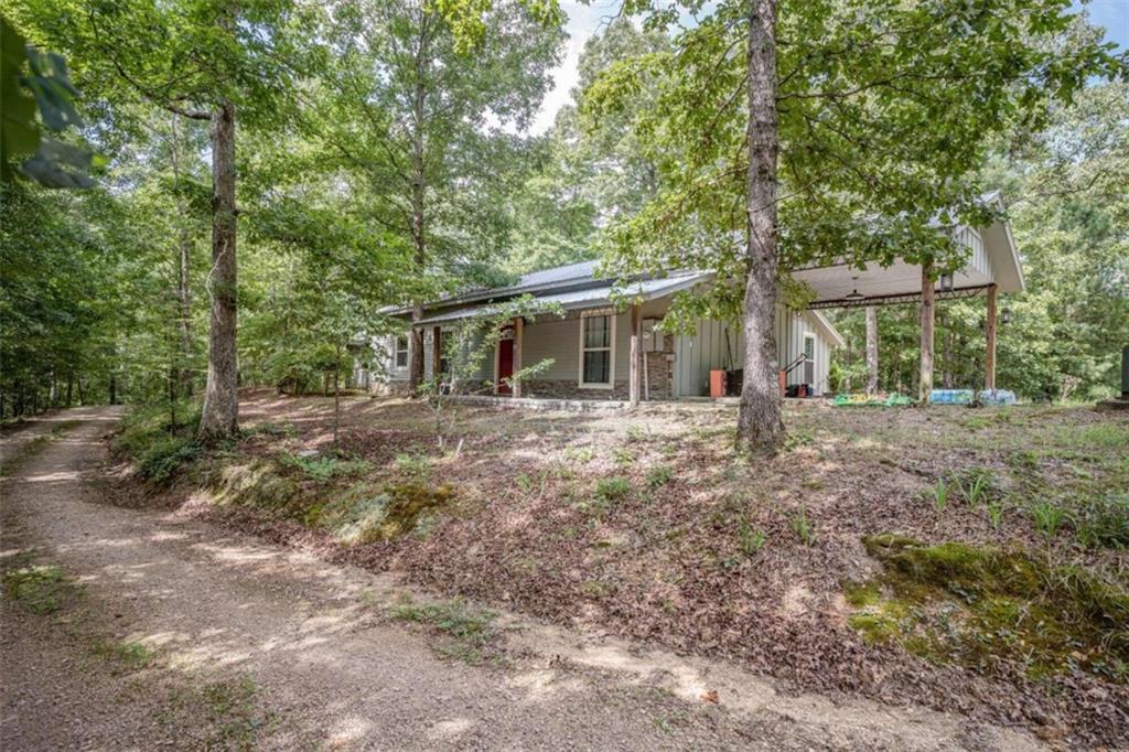 137 Ln Hill Road Summerville, GA 30747 - Photo 1 of 1 a front view of a house with a yard