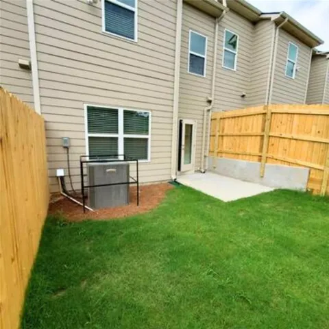 a garden view with a seating space