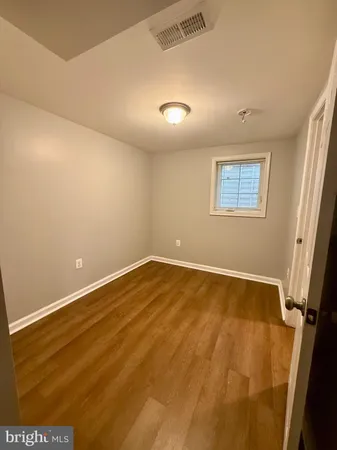 an empty room with a workbench