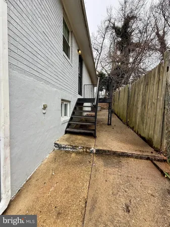 a view of a backyard with stairs