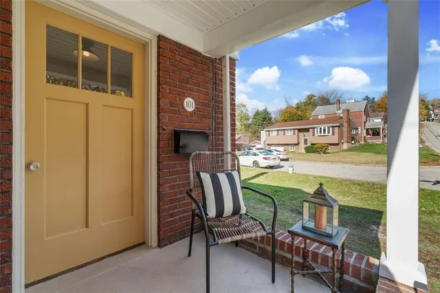 a view of a chairs and table in a patio