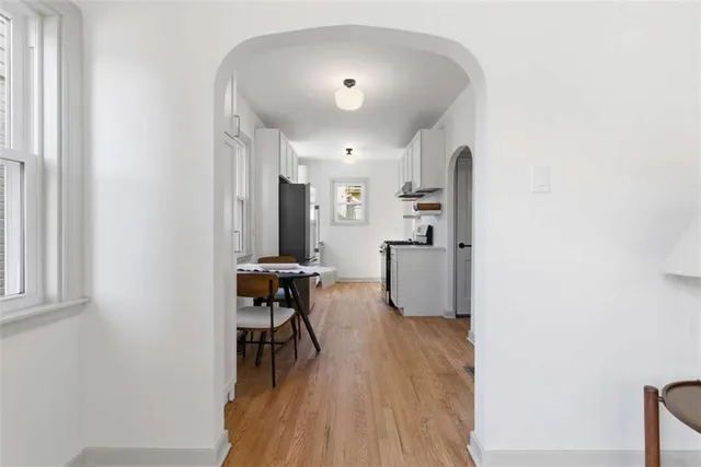 a view of a livingroom with furniture and wooden floor