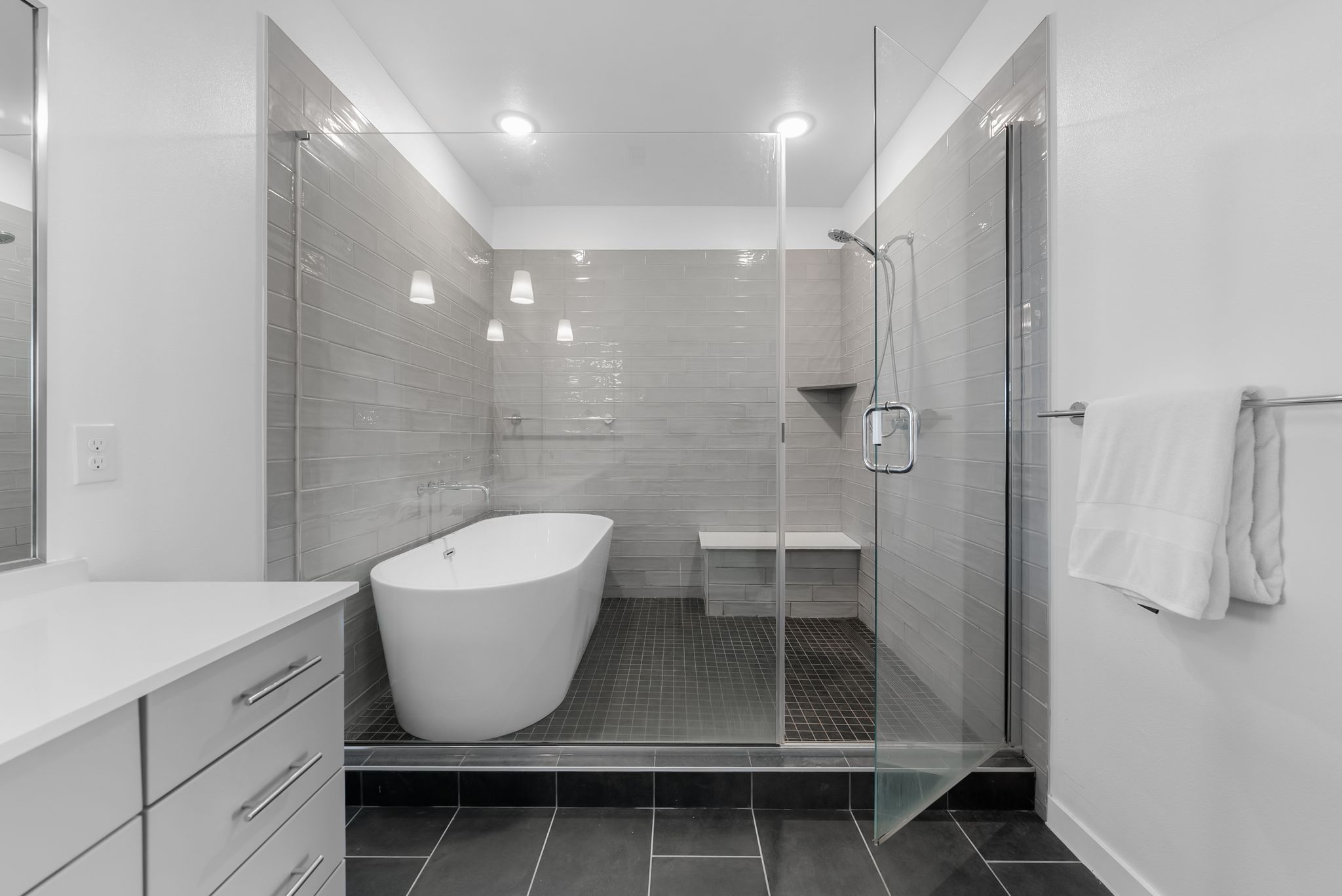 4801 Springdale Road, Unit 2410 Austin, TX 78723 - Photo 22 of 33 Primary bathroom enjoys a spa-like wet room with soaking tub and oversized shower.