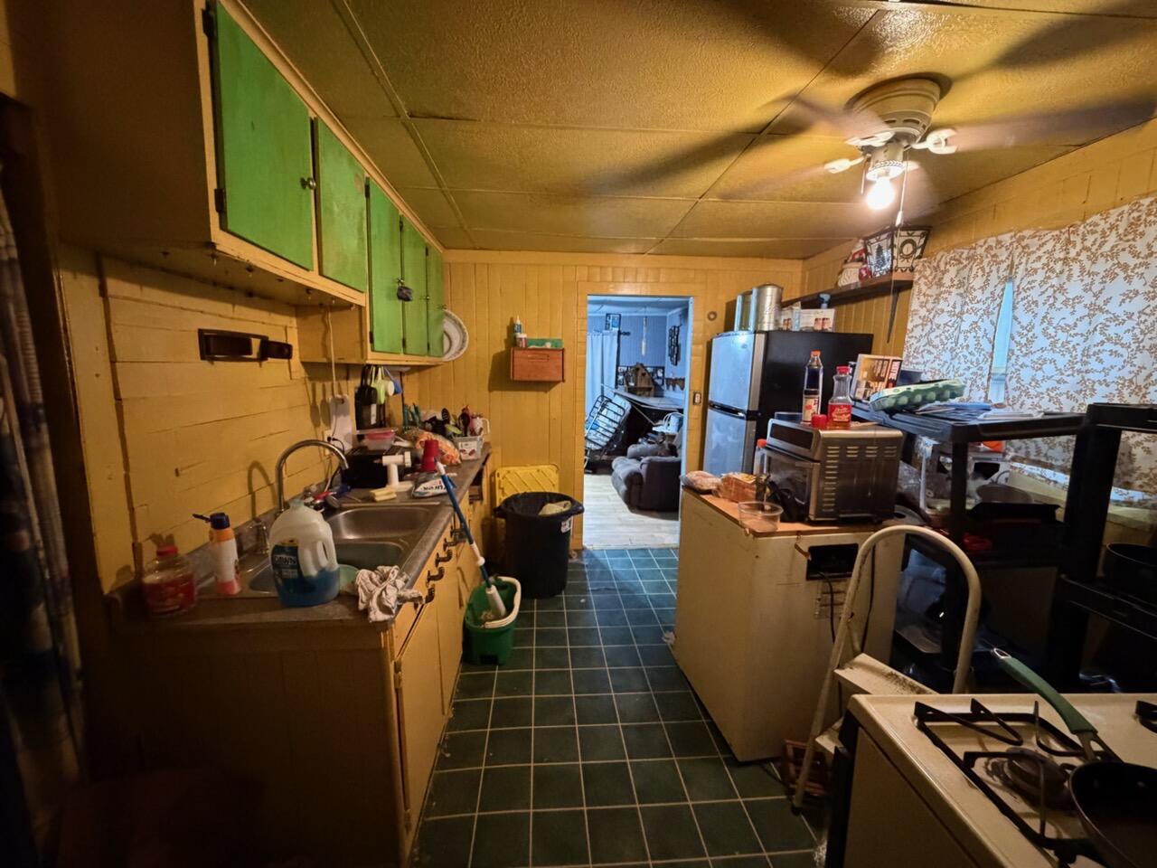 259 South Ivanhoe Road Kingsford Heights, IN 46346 - Photo 14 of 22 a room with storage and utility