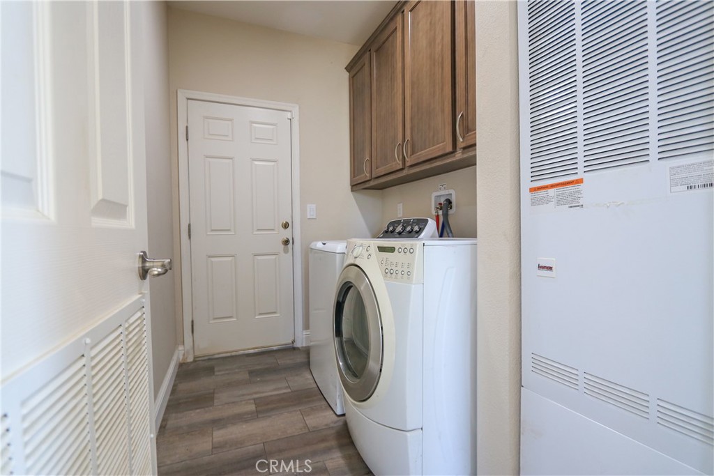 24000 Oak Cir Drive Wildomar, CA 92595 - Photo 12 of 22 a utility room with dryer and washer