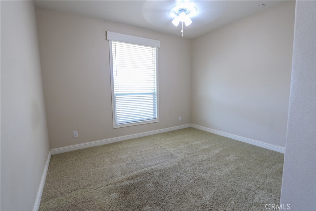 24000 Oak Cir Drive Wildomar, CA 92595 - Photo 15 of 22 an empty room with a window
