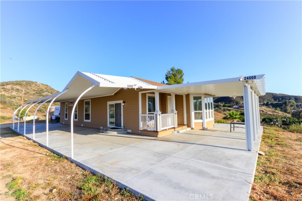 24000 Oak Cir Drive Wildomar, CA 92595 - Photo 2 of 22 a view of a house with wooden floor and a outdoor space