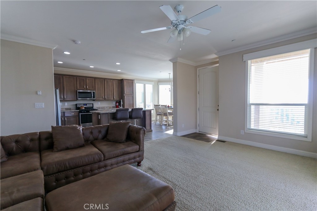 24000 Oak Cir Drive Wildomar, CA 92595 - Photo 4 of 22 a living room with furniture and a large window