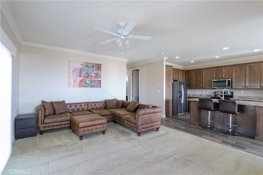 24000 Oak Cir Drive Wildomar, CA 92595 - Photo 5 of 22 a living room with furniture and kitchen view