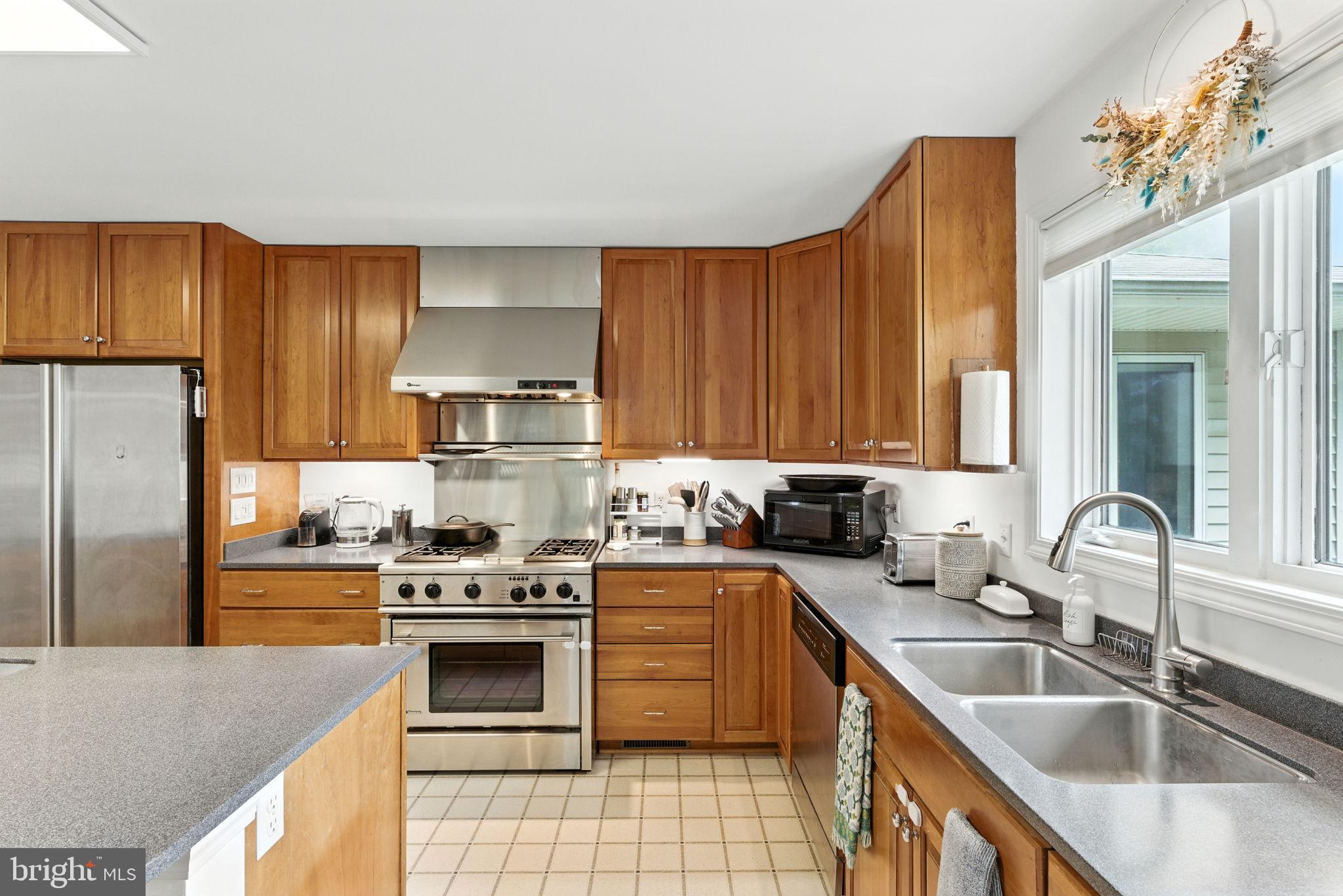 46 Rock Ridge Lane Chester Gap, VA 22623 - Photo 13 of 66 Warm wood tones in a bright kitchen space.