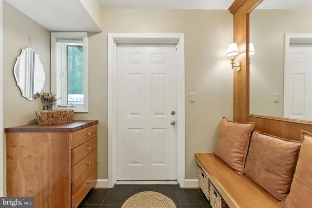 a bed room with a bed and a large mirror