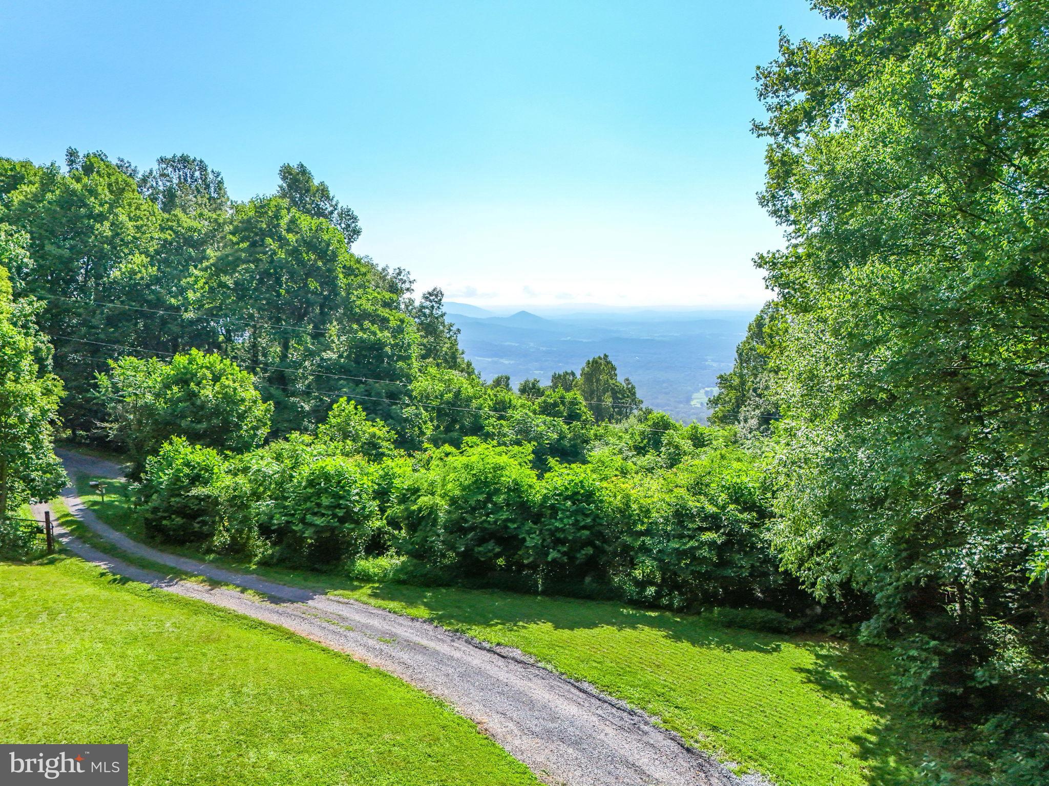 46 Rock Ridge Lane Chester Gap, VA 22623 - Photo 2 of 66 Serene hillside retreat with stunning views.