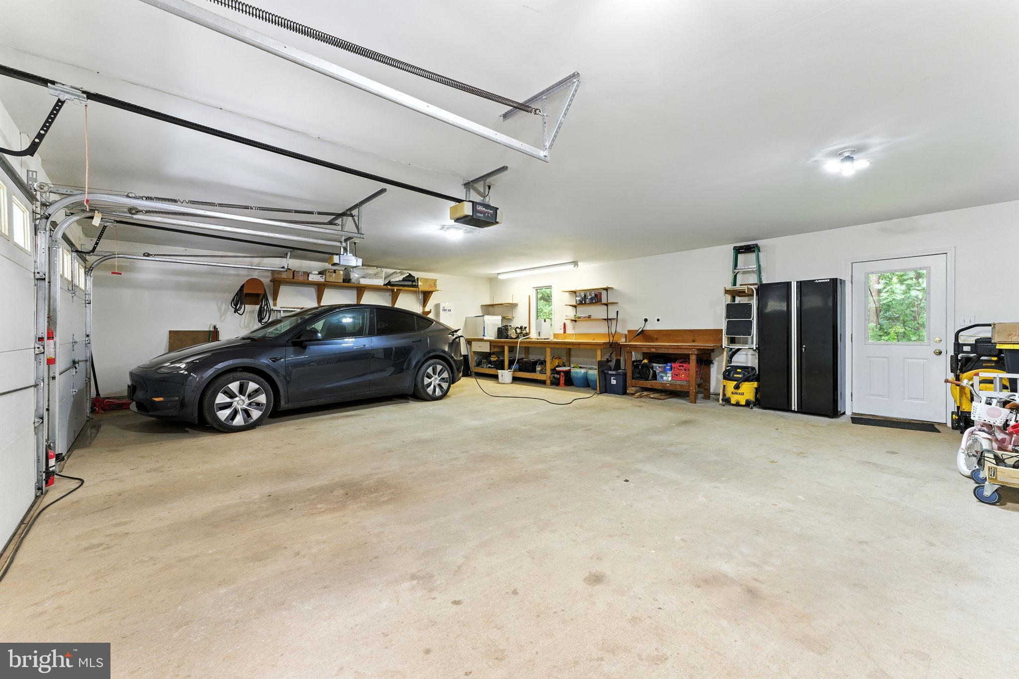 46 Rock Ridge Lane Chester Gap, VA 22623 - Photo 26 of 66 Spacious 2 car garage w/ EV charging capabilities