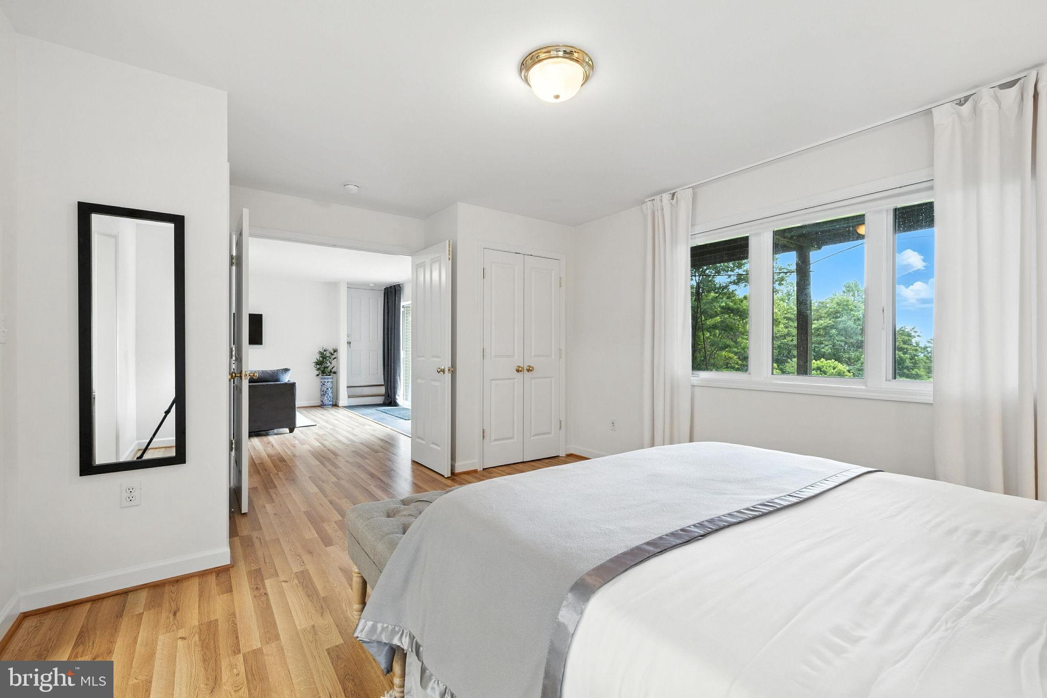 46 Rock Ridge Lane Chester Gap, VA 22623 - Photo 41 of 66 Bright and airy bedroom with scenic views.