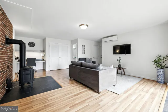 a view of a house with backyard and porch