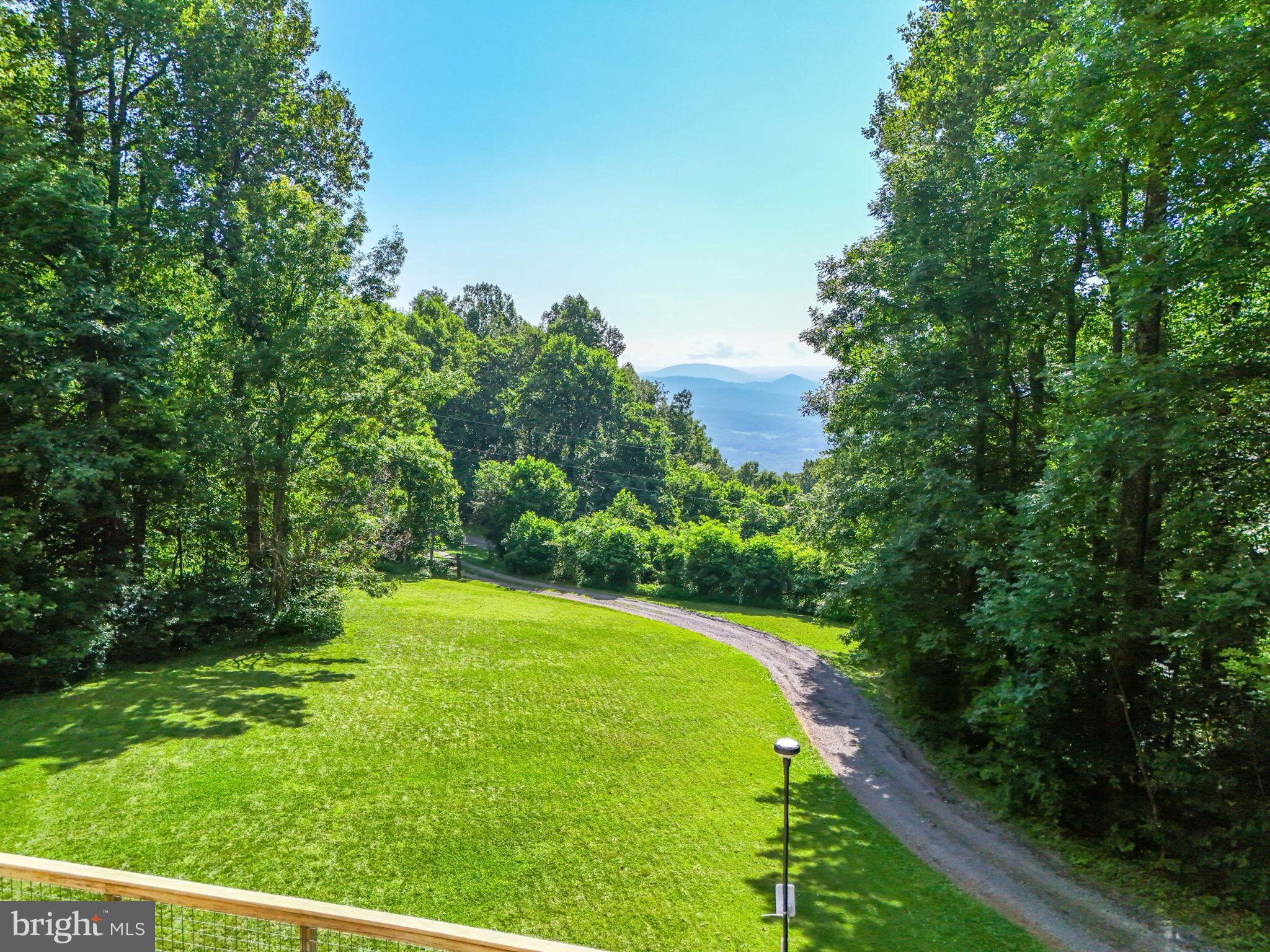 46 Rock Ridge Lane Chester Gap, VA 22623 - Photo 50 of 66 Serene landscape with lush greenery and hills.