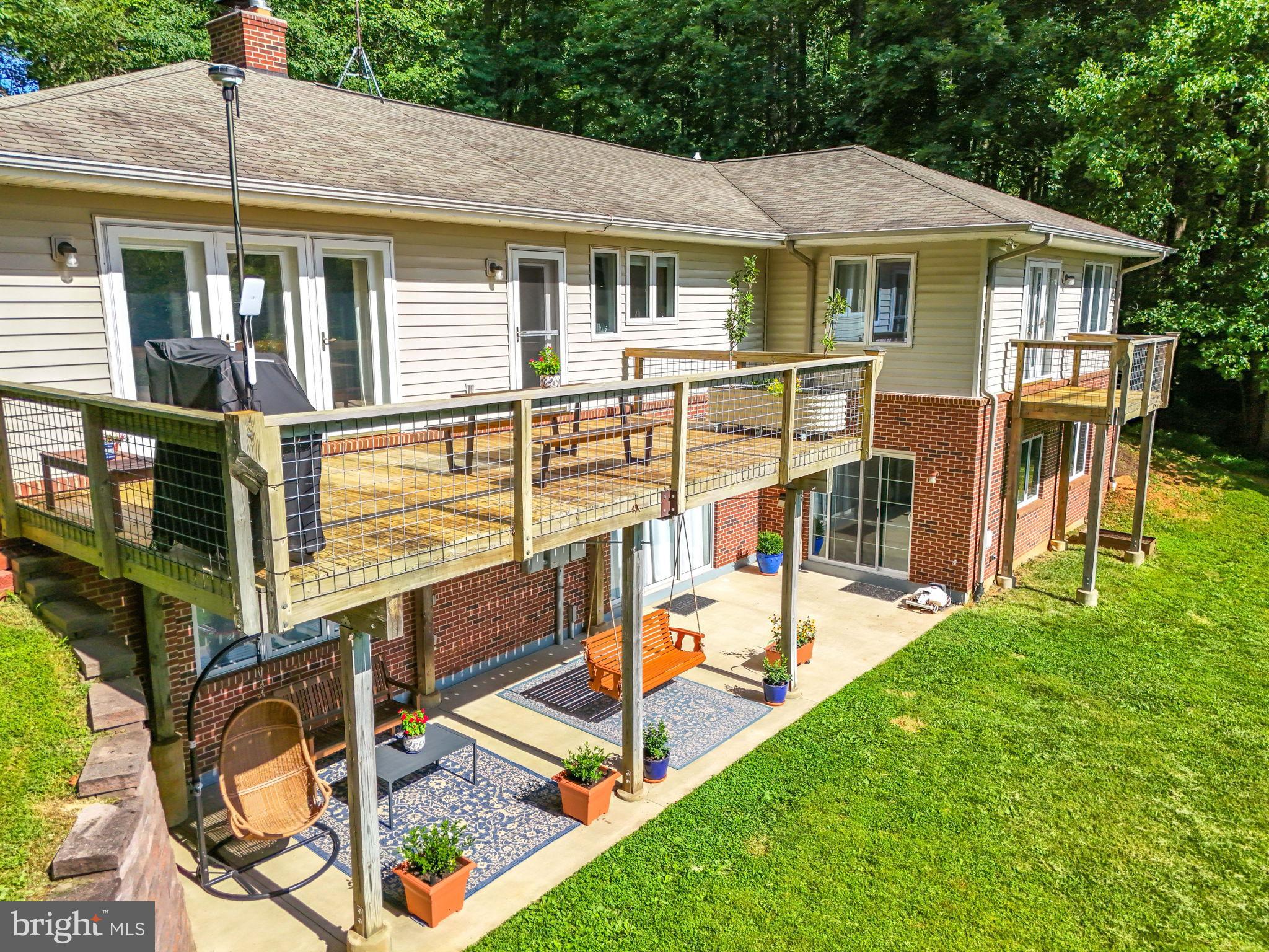 46 Rock Ridge Lane Chester Gap, VA 22623 - Photo 56 of 66 Main deck and deck off primary bedroom