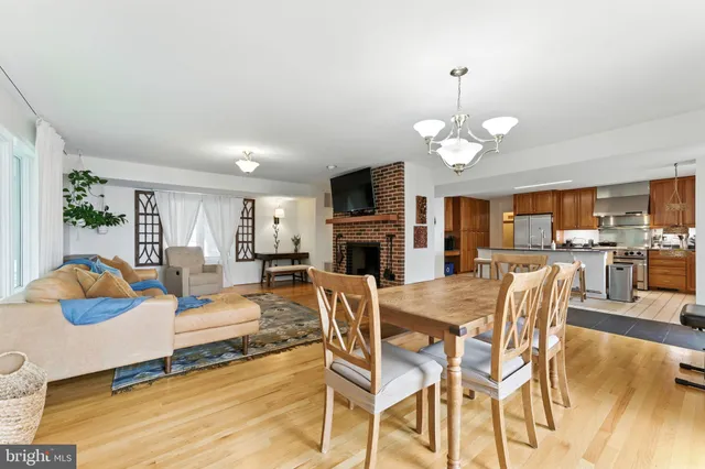 a kitchen with a stove sink and refrigerator
