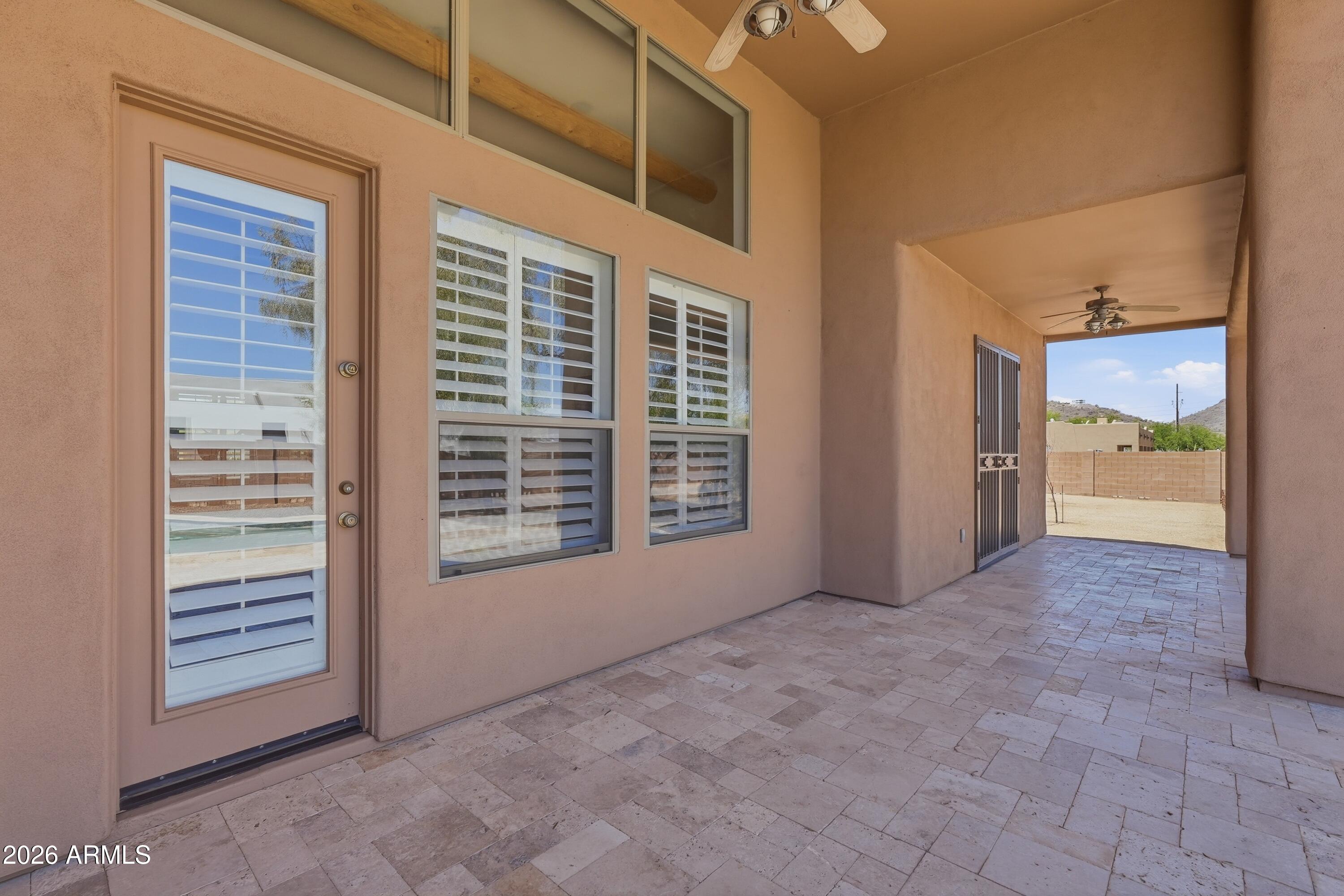 2616 West Canyon Road Phoenix, AZ 85086 - Photo 28 of 45 a view of an empty room with a window
