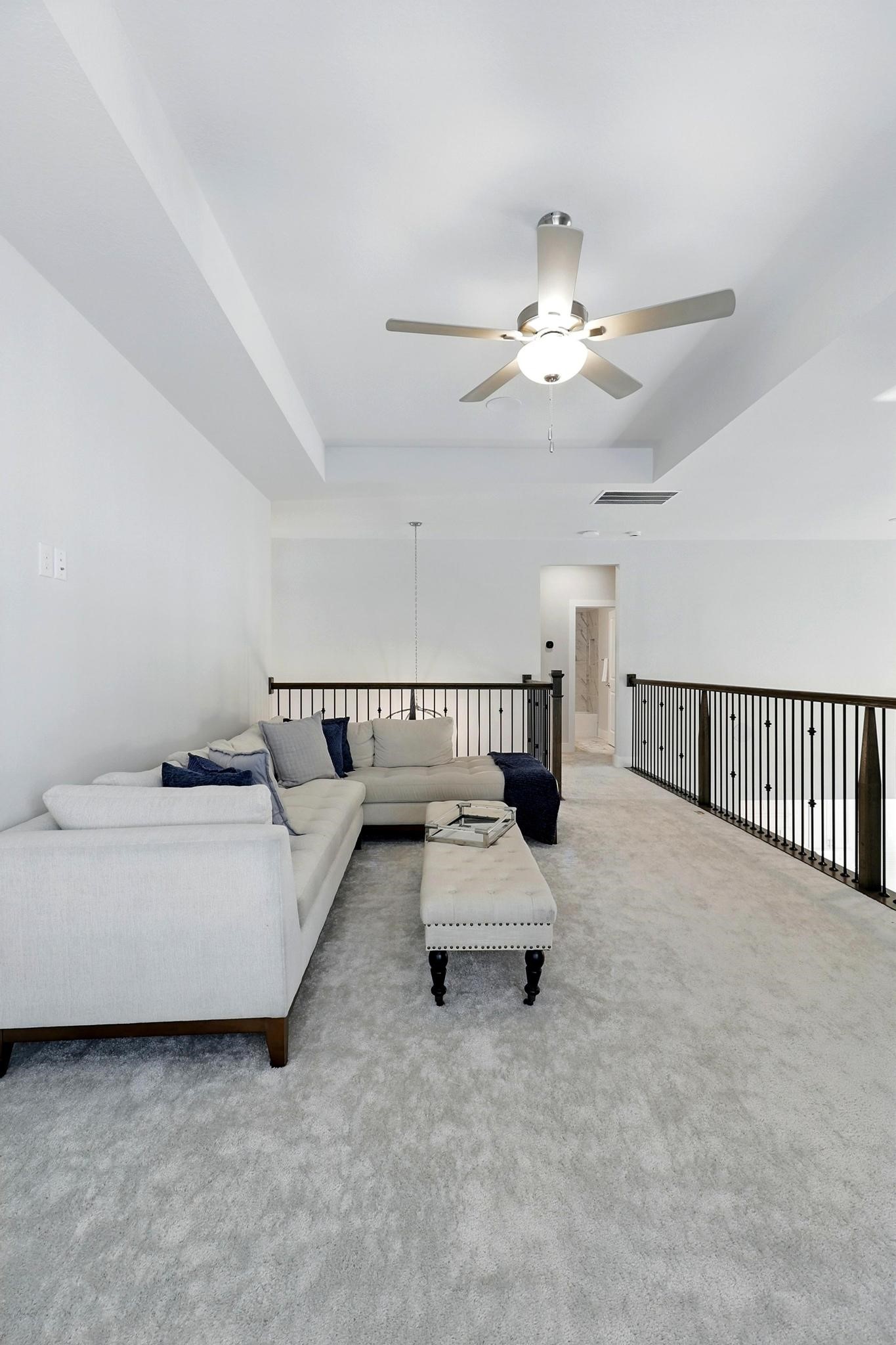 26923 Arethusa Court Spring, TX 77389 - Photo 26 of 44 This spacious game room located upstairs is ideal for creating a cozy and fun atmosphere.