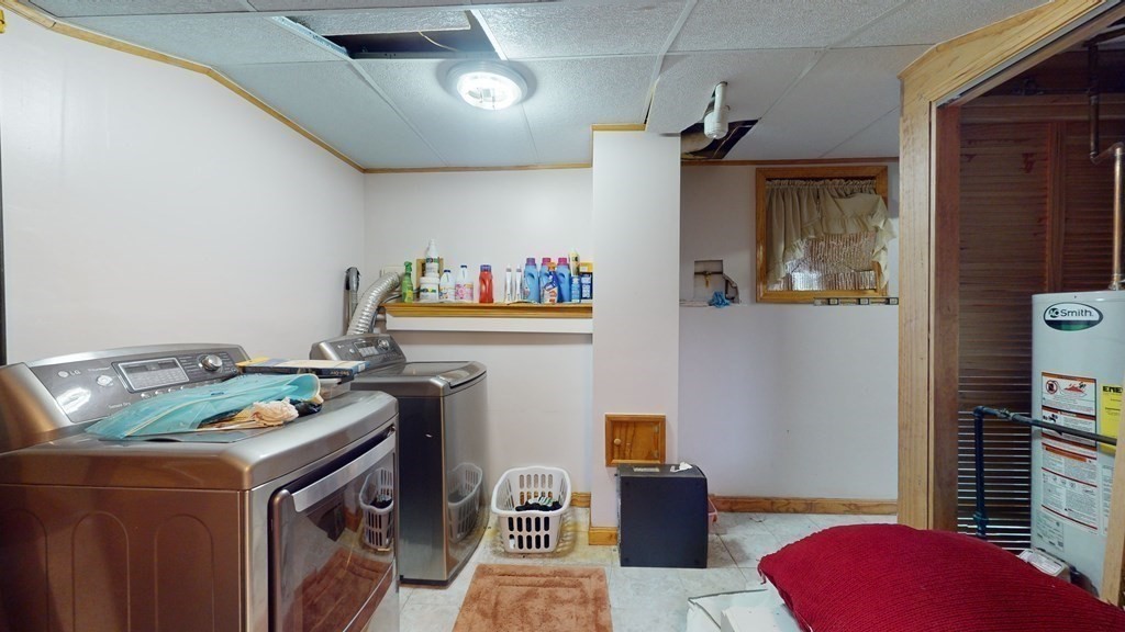 8 Fernwood Road Billerica, MA 01821 - Photo 14 of 23 a utility room with fridge dryer and washer