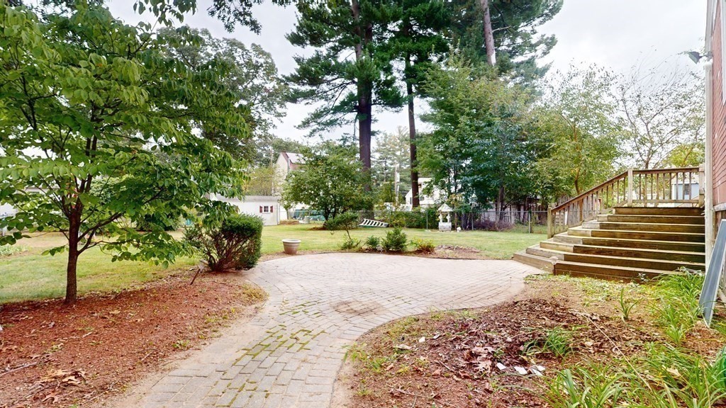 8 Fernwood Road Billerica, MA 01821 - Photo 16 of 23 a view of a yard with plants and trees