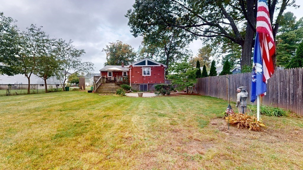 8 Fernwood Road Billerica, MA 01821 - Photo 17 of 23 a view of a house with a yard