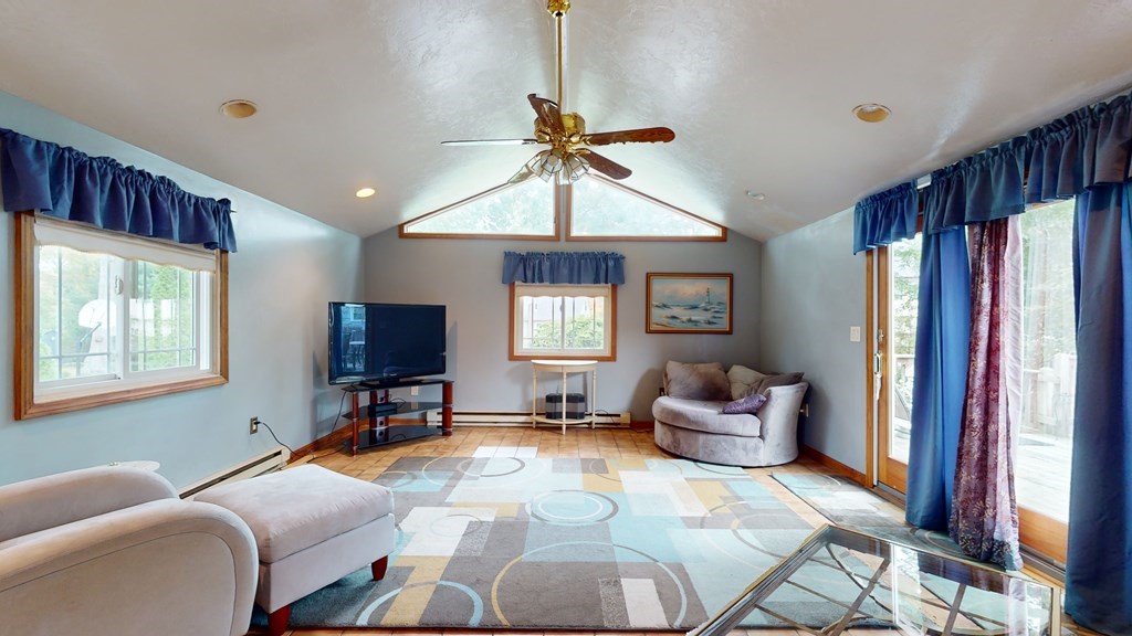 8 Fernwood Road Billerica, MA 01821 - Photo 10 of 23 a bedroom with furniture or window and a flat screen tv