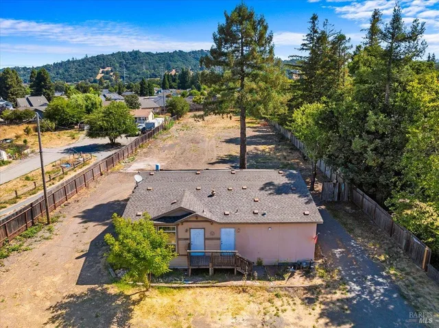 a front view of house with garden