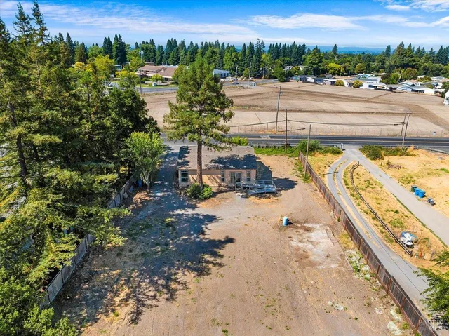 a view of a backyard of the house
