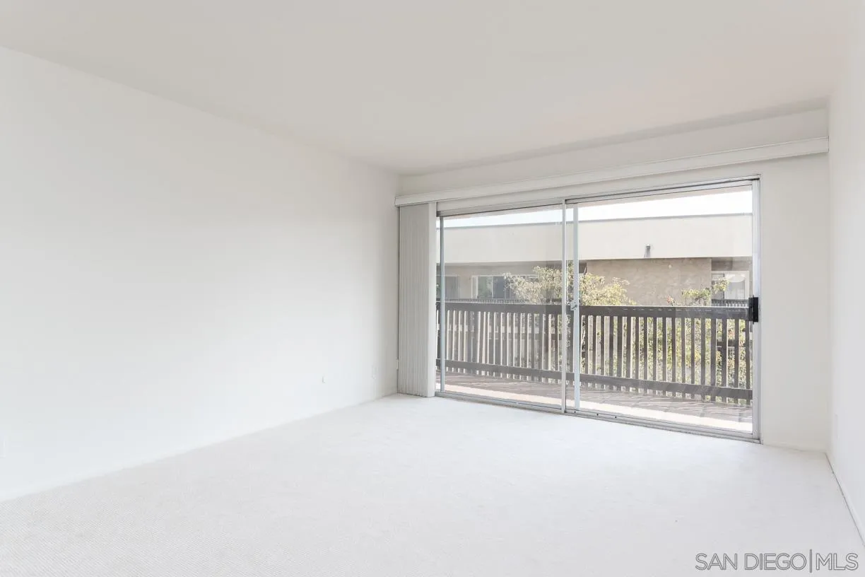 6314 Friars Road, Unit 301 San Diego, CA 92108 - Photo 2 of 31 a view of a room with sliding door