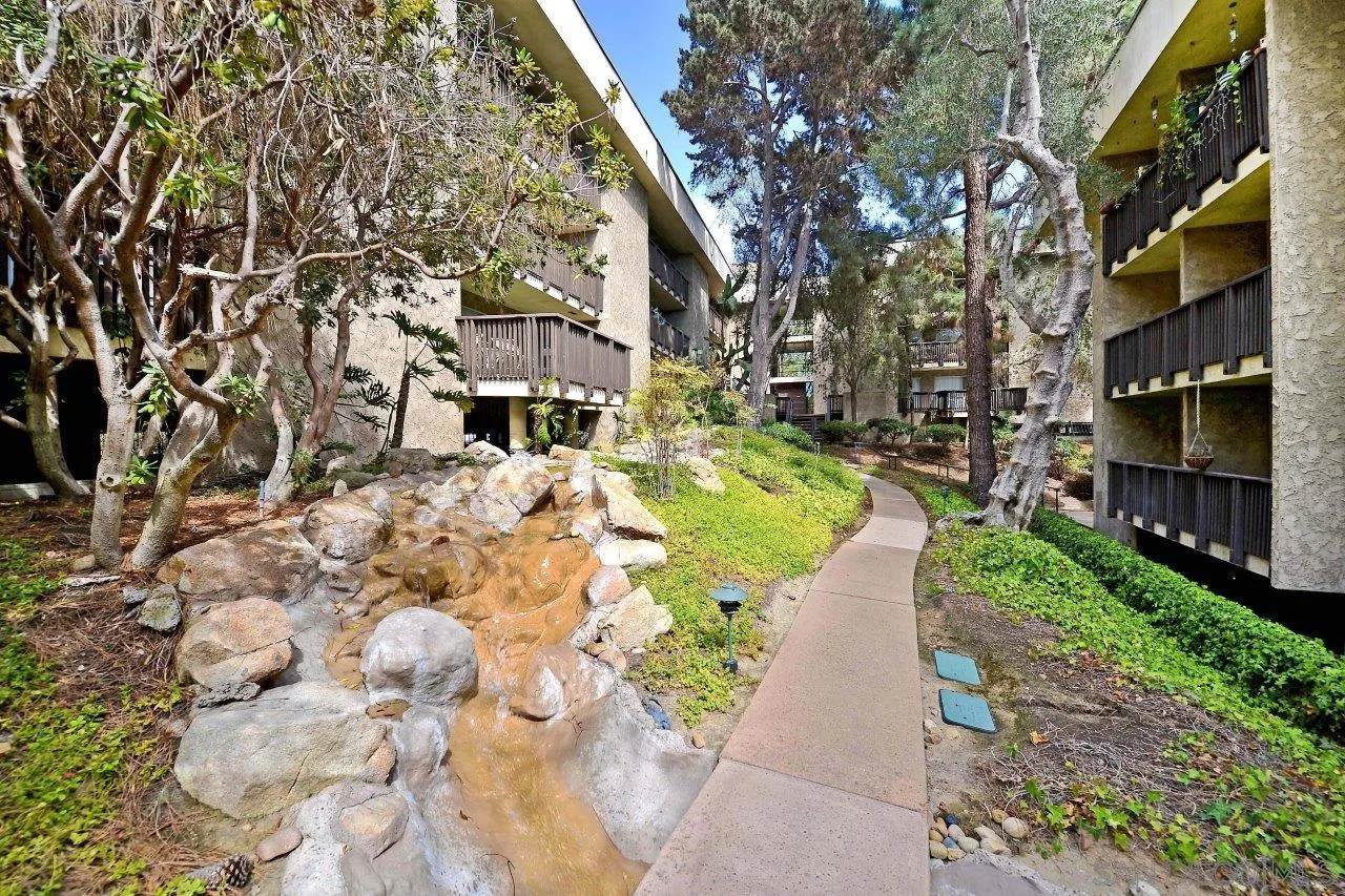 6314 Friars Road, Unit 301 San Diego, CA 92108 - Photo 21 of 31 a view of a pathway with a house