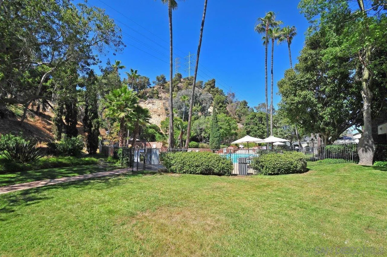 6314 Friars Road, Unit 301 San Diego, CA 92108 - Photo 22 of 31 a view of a garden with a house