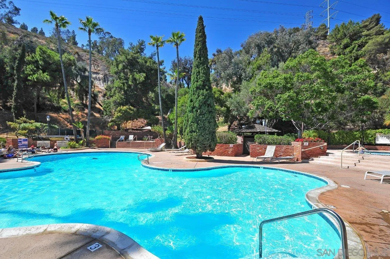 6314 Friars Road, Unit 301 San Diego, CA 92108 - Photo 23 of 31 a view of a backyard with swimming pool