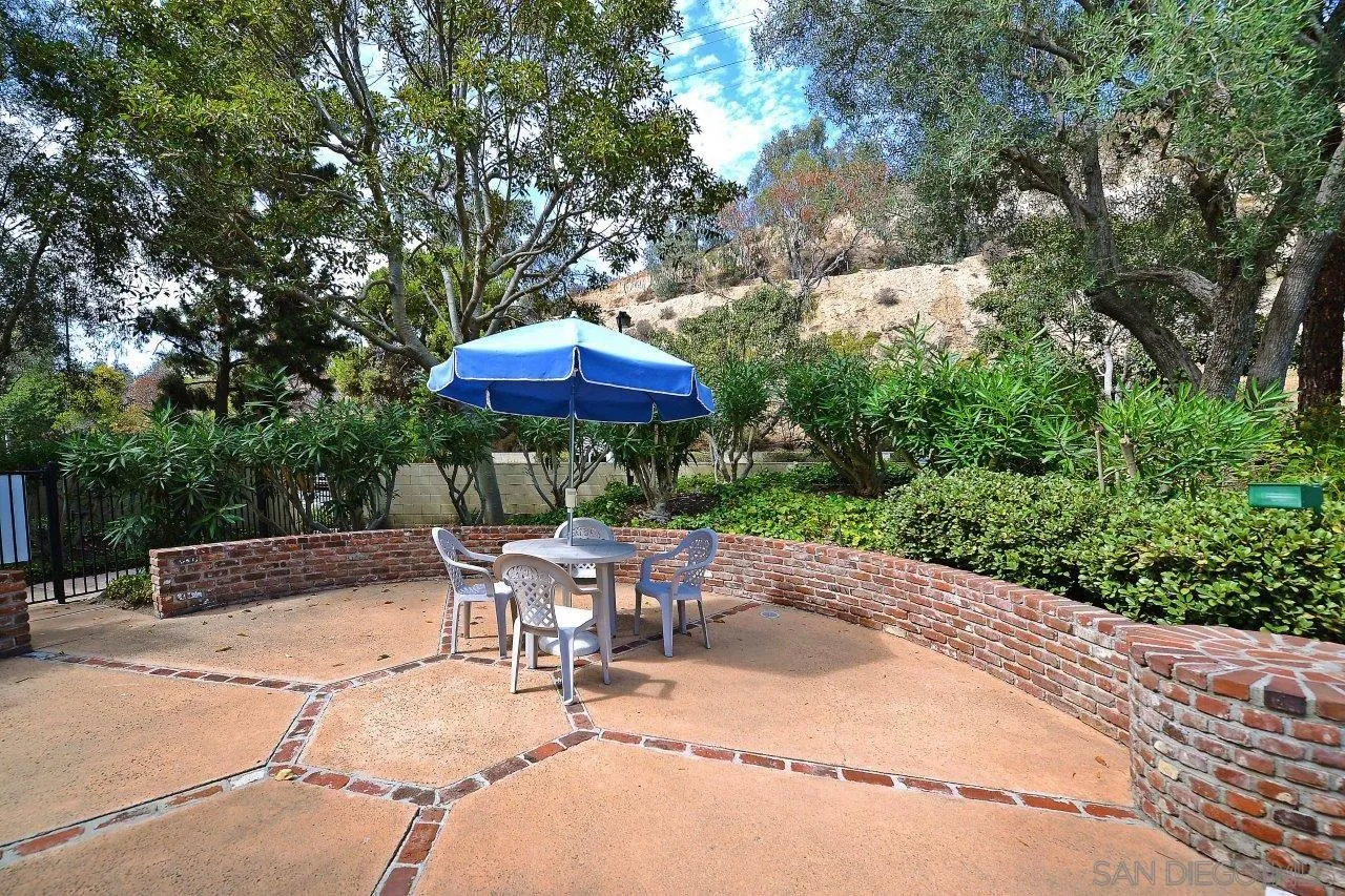 6314 Friars Road, Unit 301 San Diego, CA 92108 - Photo 31 of 31 an outdoor space with patio and umbrella