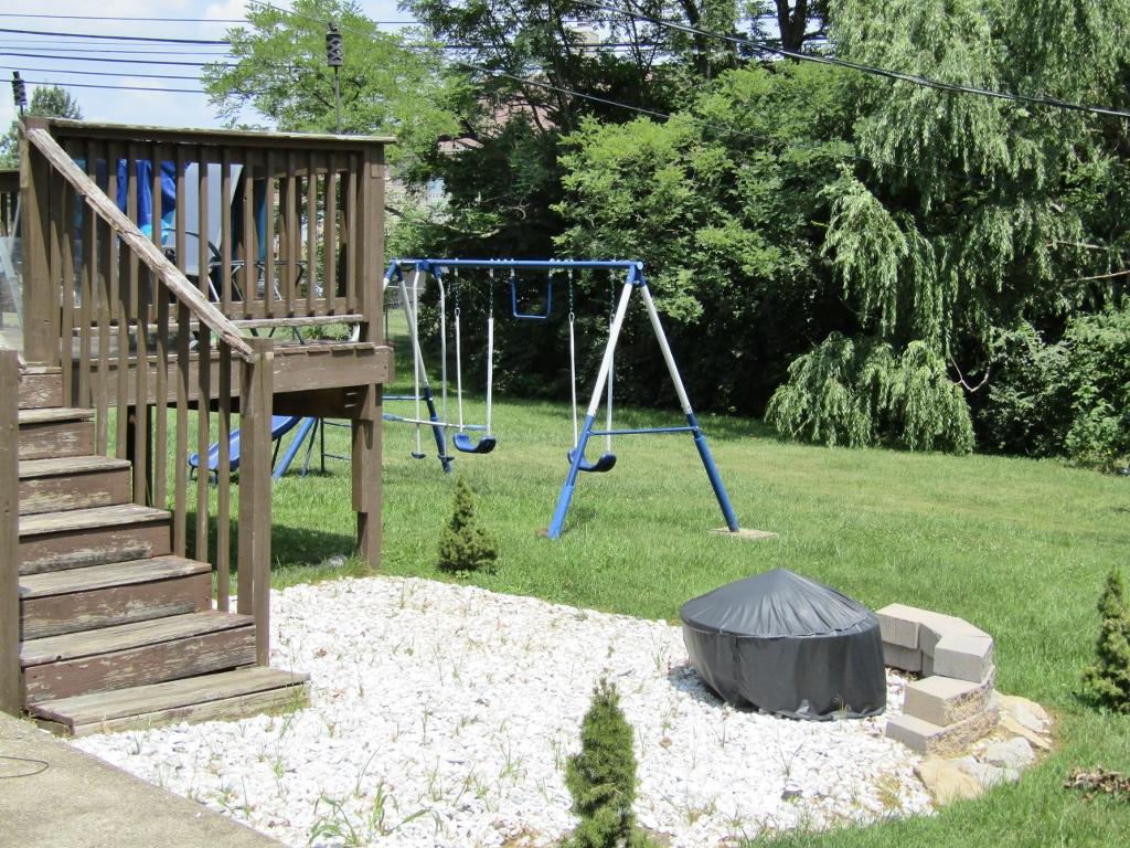 back-deck,rocks, swing, yard