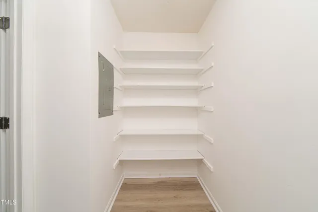a view of staircase with white walls