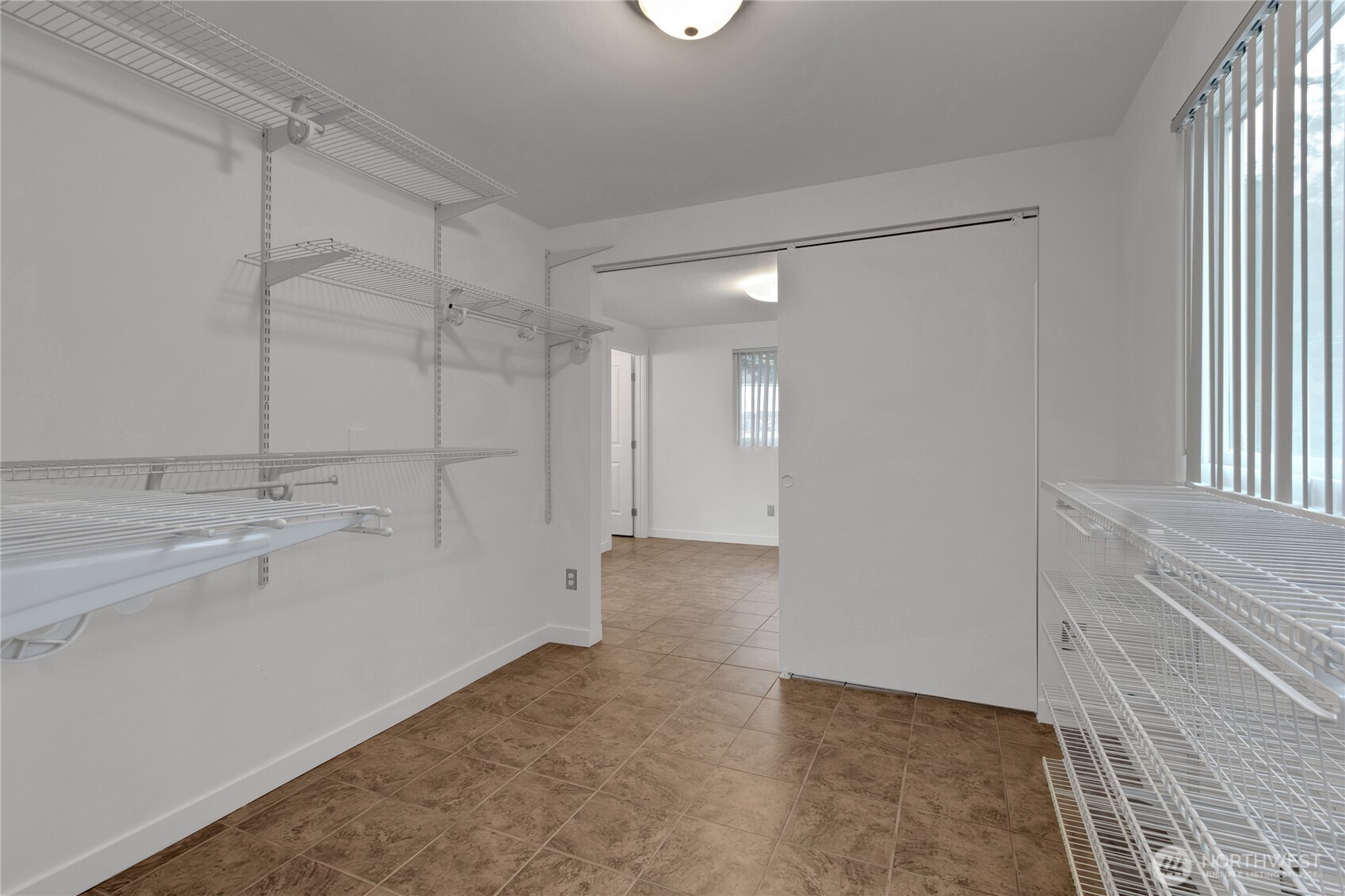 2356 South Angeline Street Seattle, WA 98108 - Photo 13 of 35 a view of a room that has a sink and a window